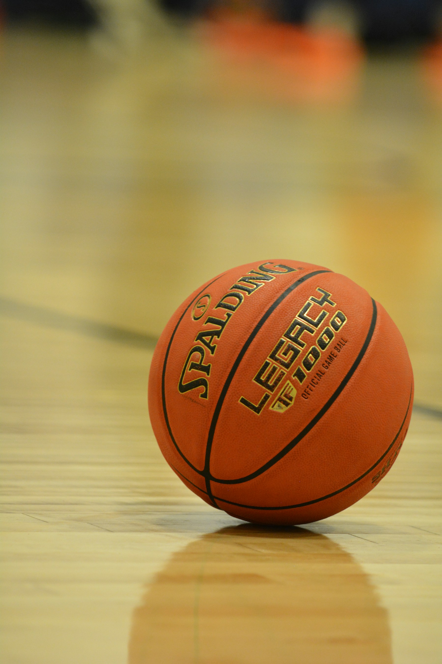 Basketball on a polished indoor court